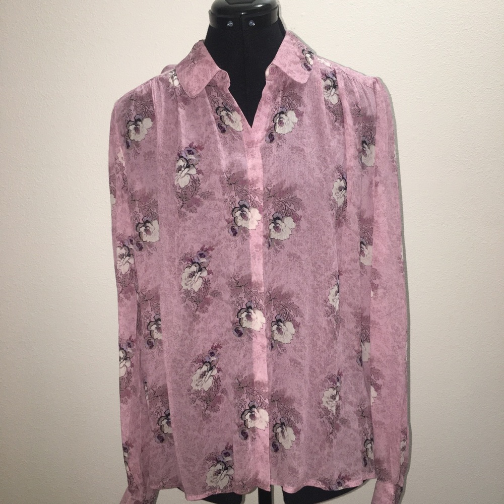 This gorgeous long-sleeve blouse is crafted from 100% silk georgette